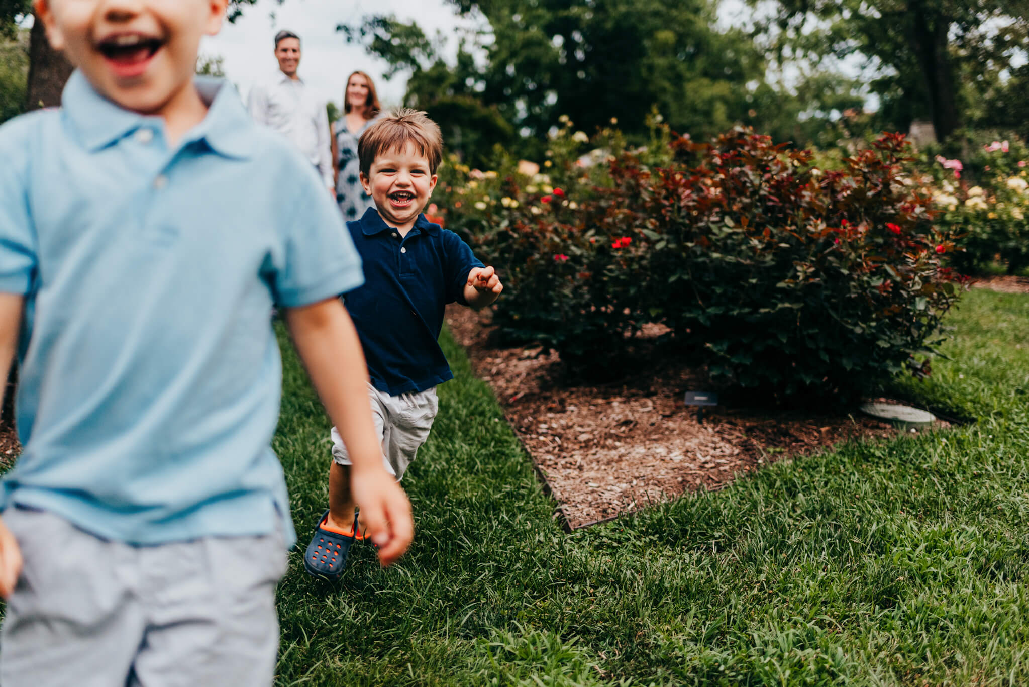 Two children running while featured in post about Delaware Summer Camps